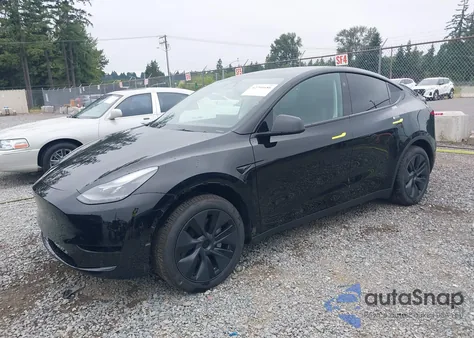 2024 Tesla Model Y из США, поврежденный, VIN 7SAYGDED1RF159399